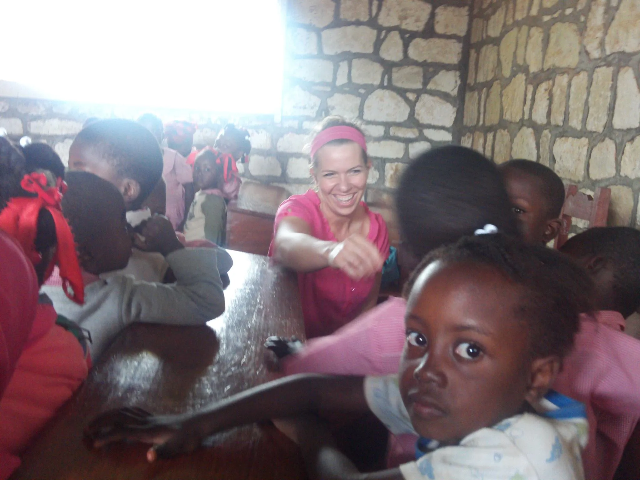 Jayme Sinclair working with children in Port-de-Paix, Haiti
